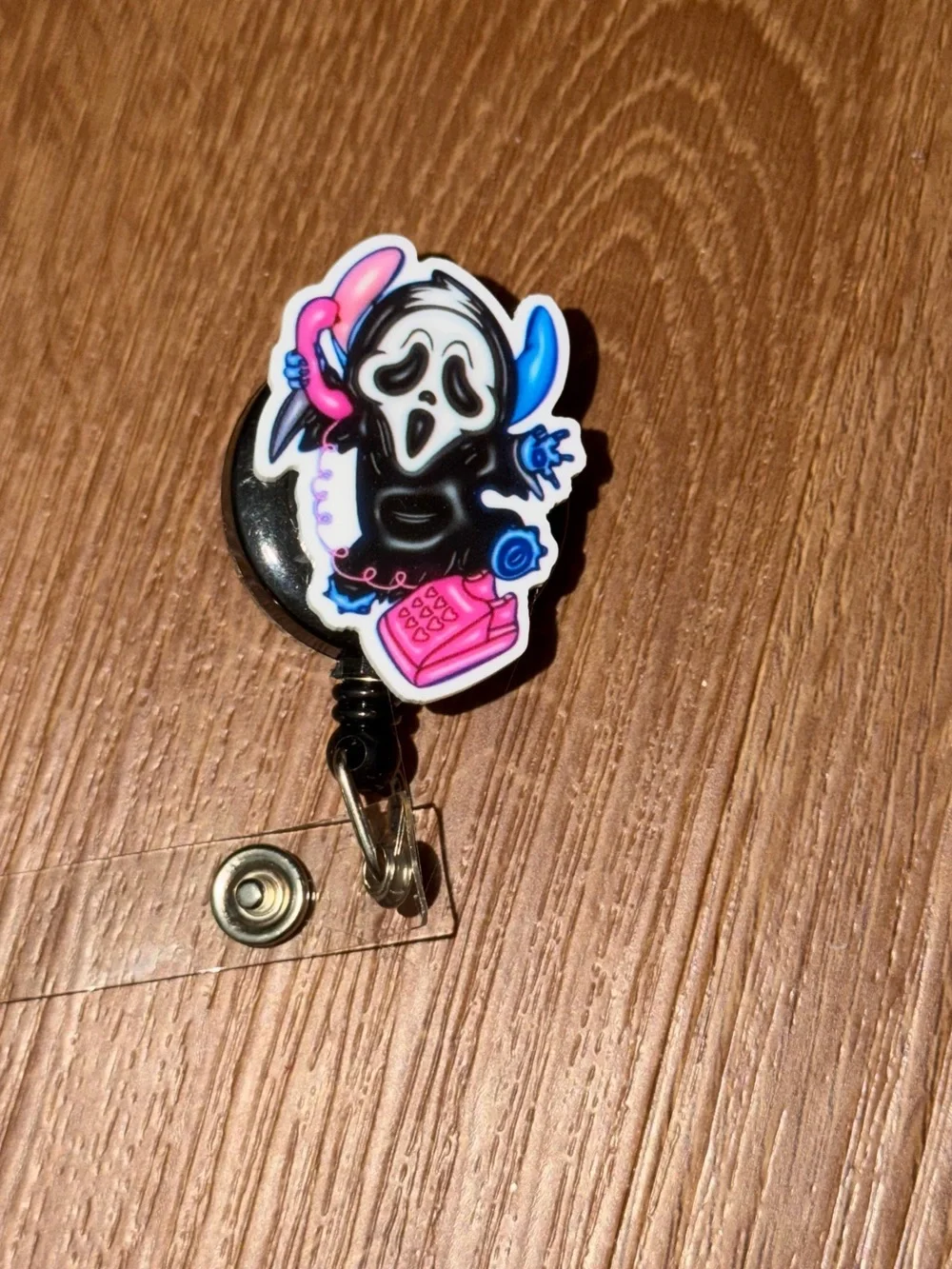 Scream Caller Acrylic Badge Reel in Black, Pink & Blue